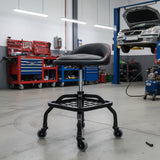 Heavy-duty rolling workshop stool with 360° swivel, pneumatic height adjustment (495–635mm), lumbar support, and 150kg capacity. Shop at Herbos Equipment NZ.